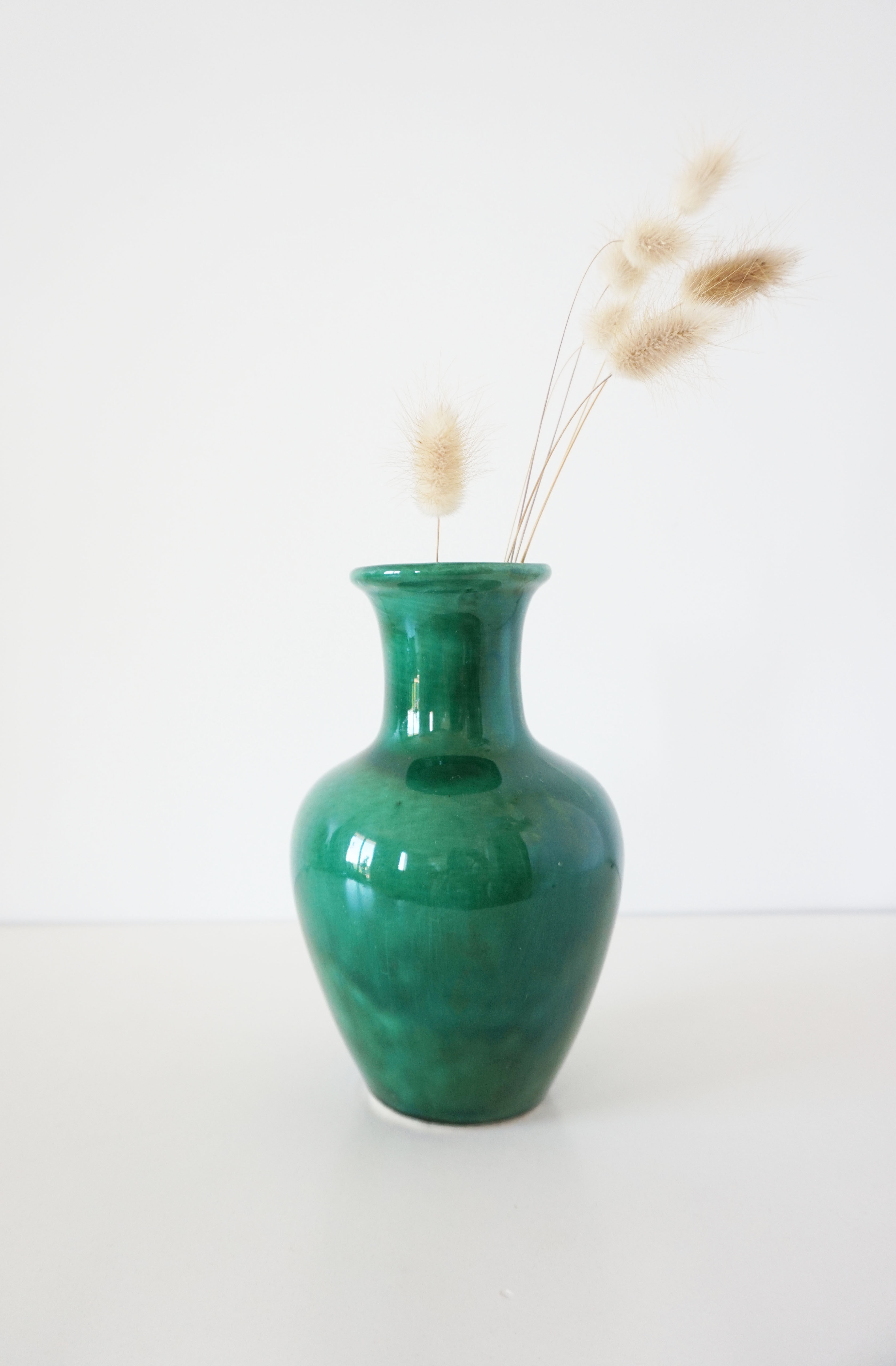 Green iridescent ceramic vase