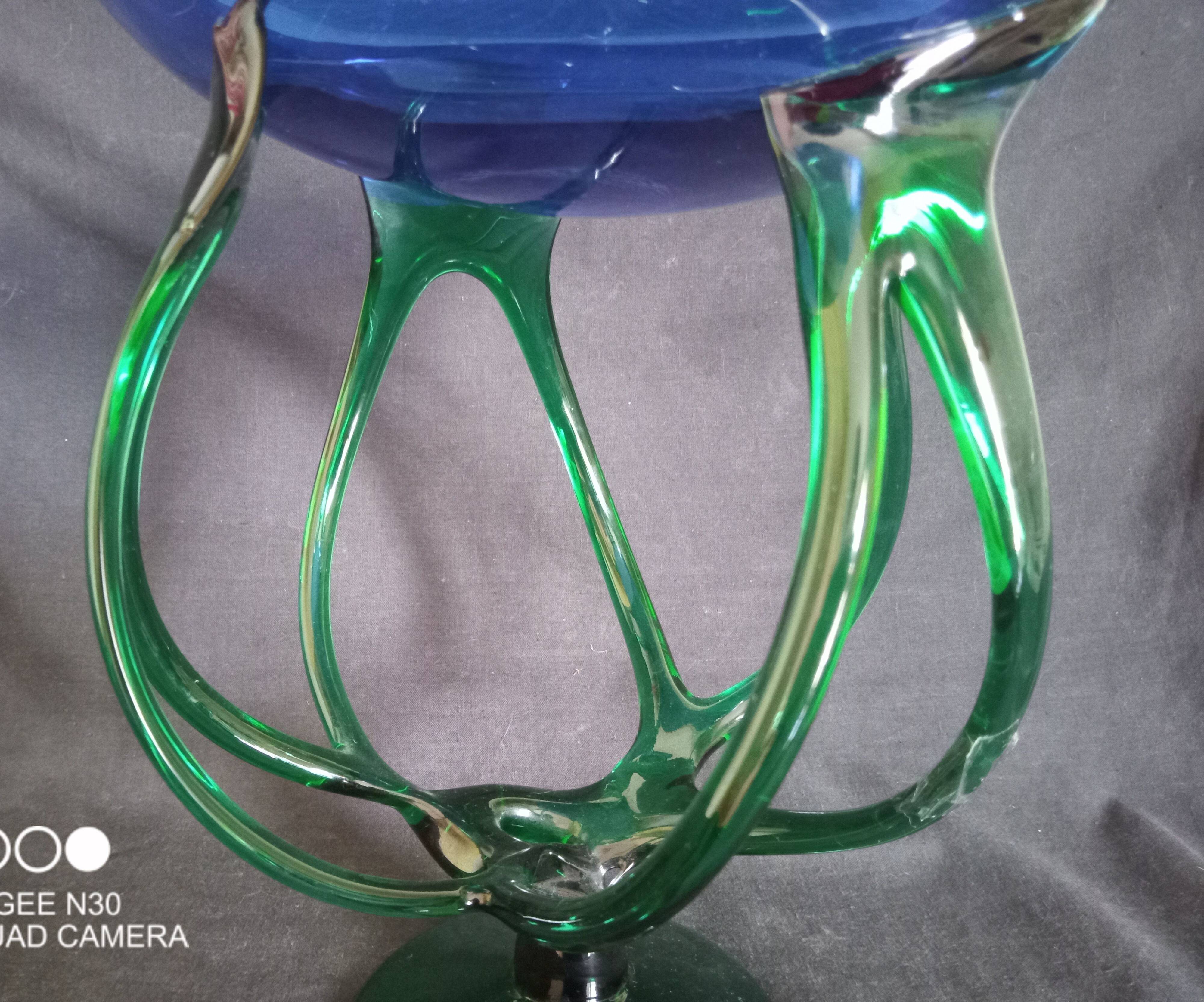 Bowl, centerpiece on twisted blue and green glass legs