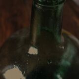 Dame Jeanne carboy from the Viresa Collection in green glass