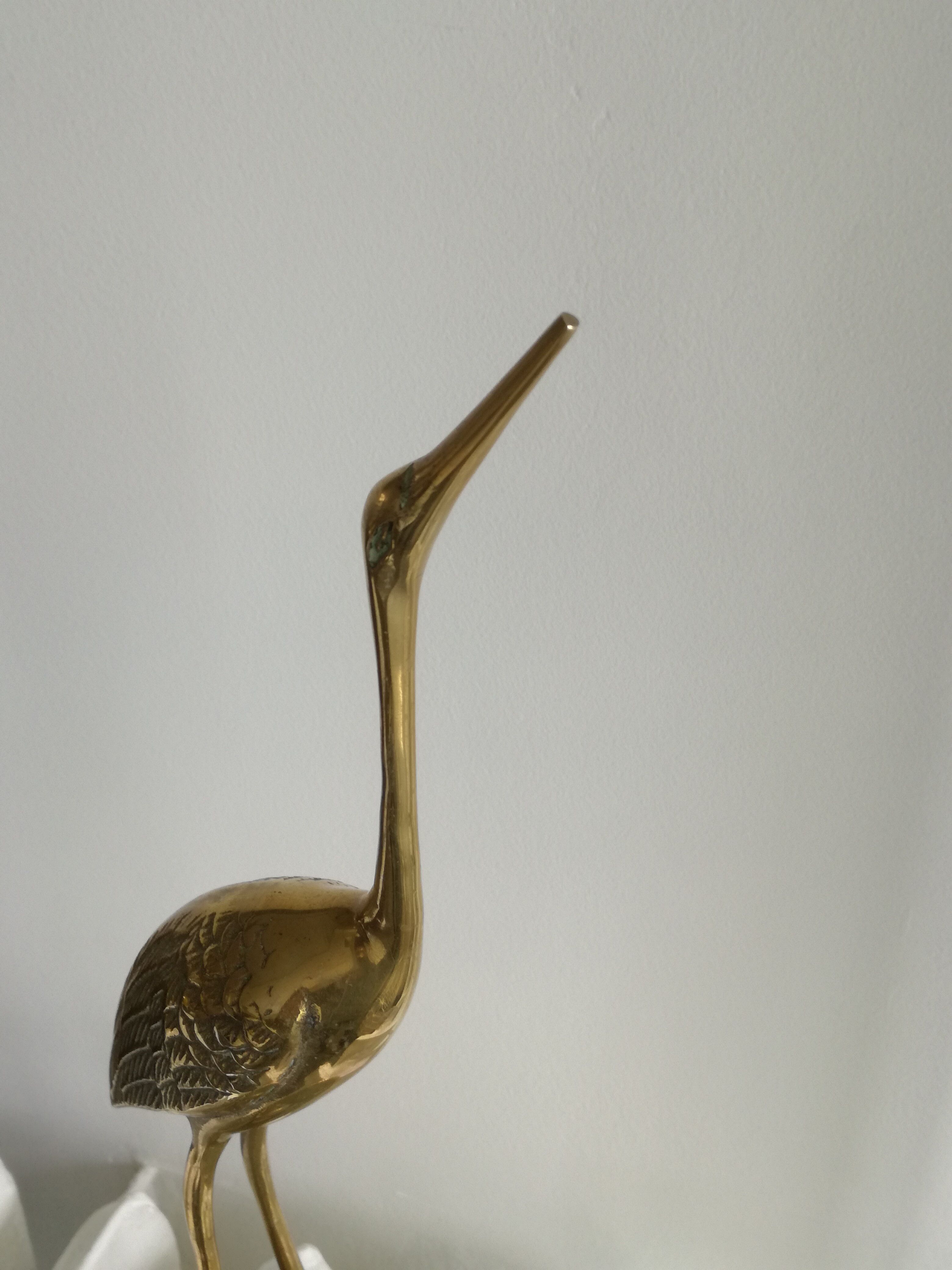 Heron vintage brass