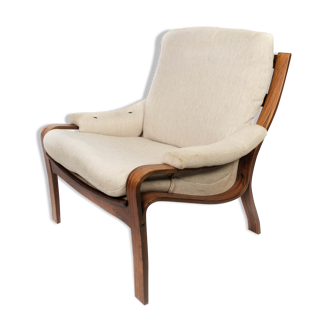 Armchair in rosewood and upholstered with light fabric, of Danish design, 1960s
