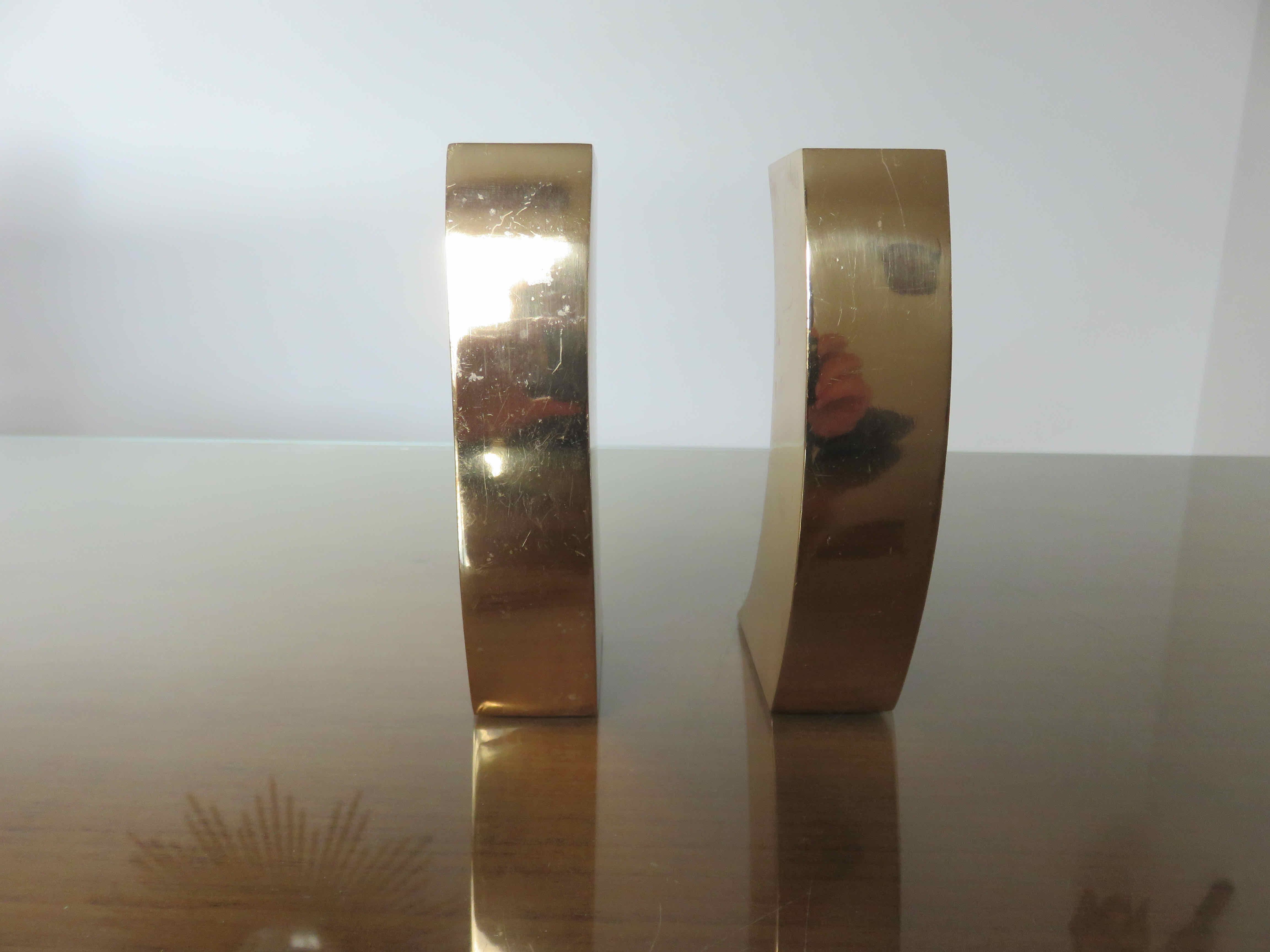 Pair of candle holders in golden brass, 70s