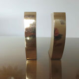 Pair of candle holders in golden brass, 70s
