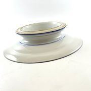 Compotier or flat cut with monogrammed white biscuit cake