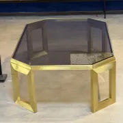 Octagonal brass coffee table, signed Anna Nora.