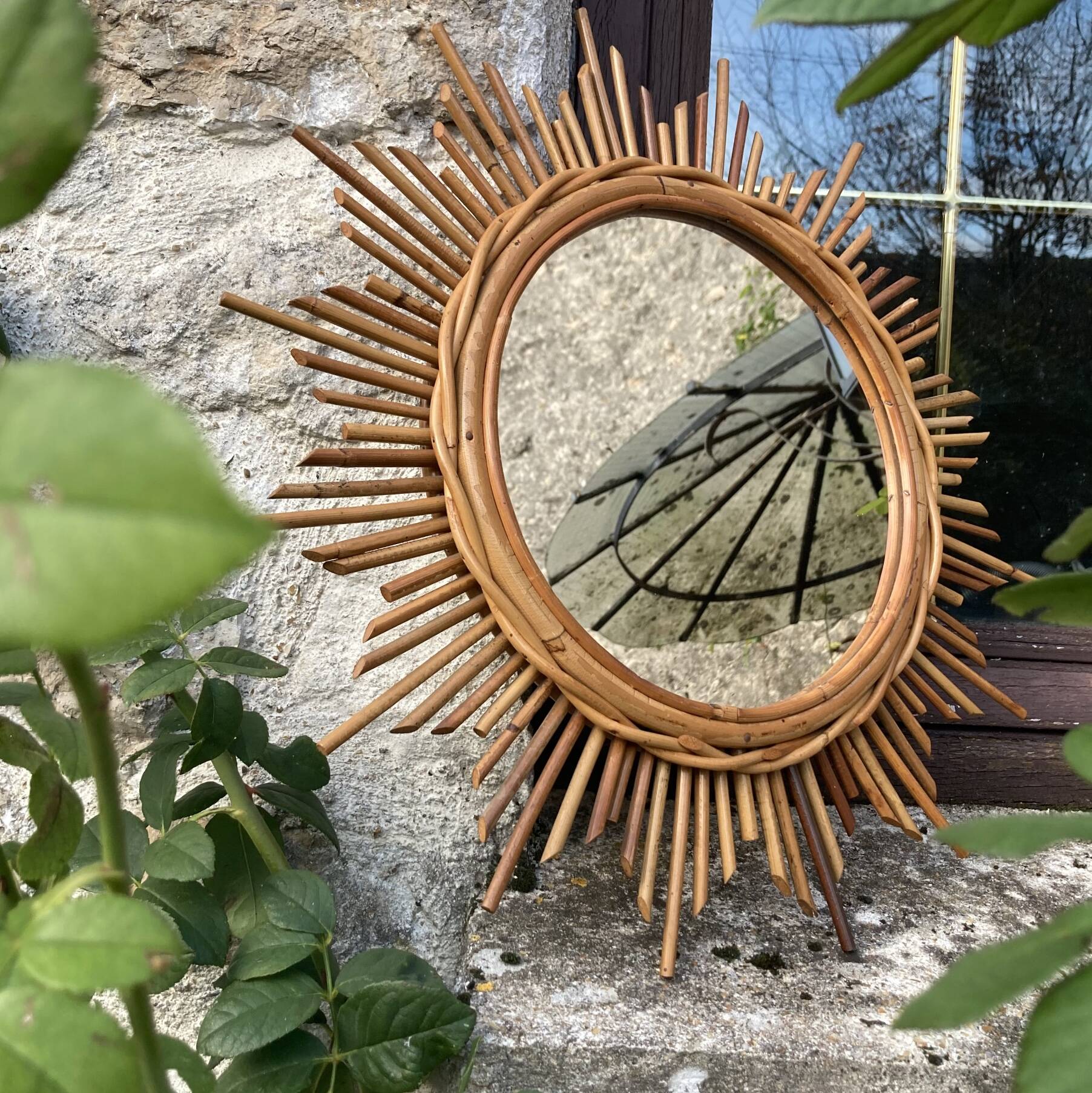 Vintage rattan sun mirror
