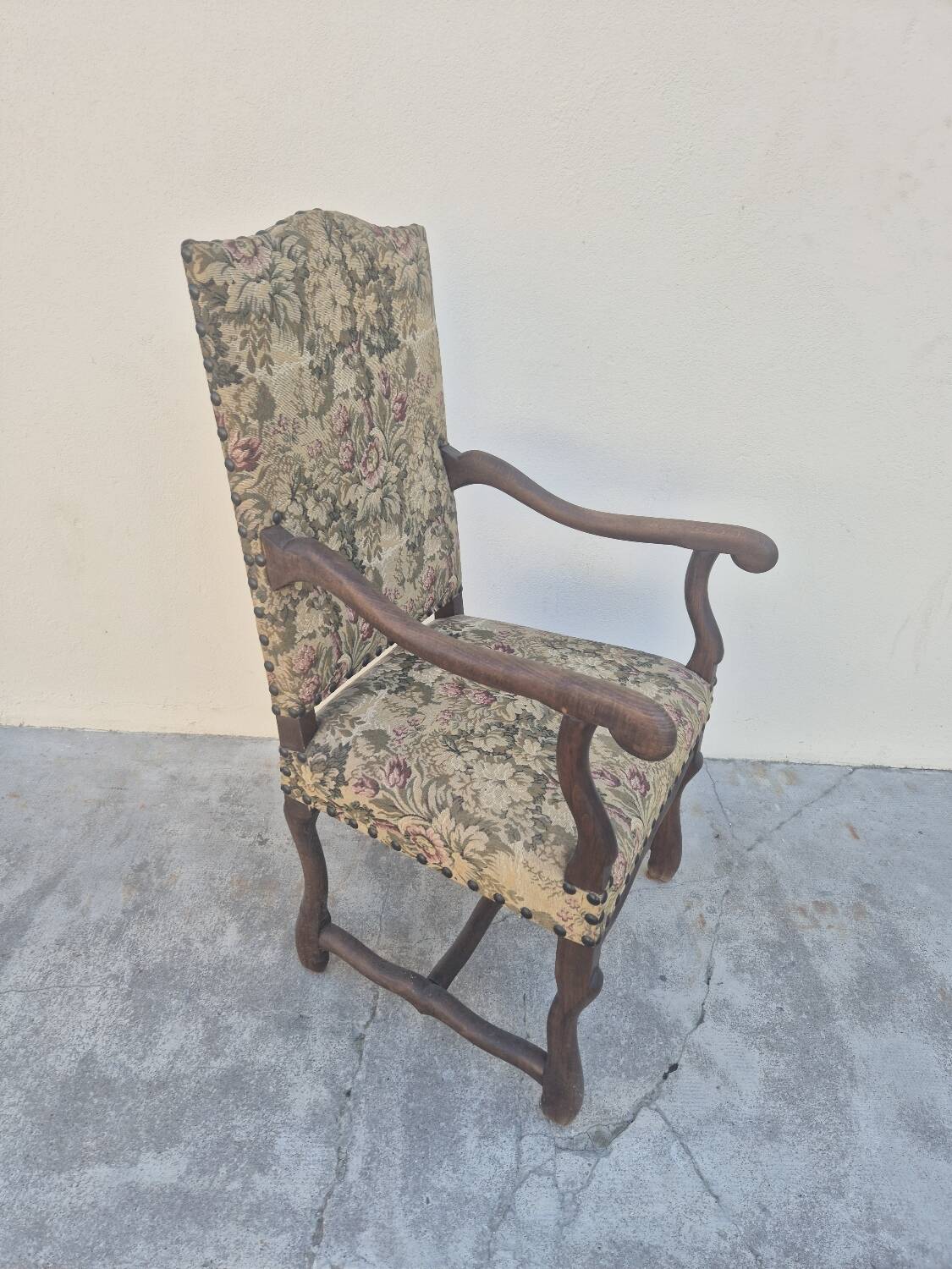 Louis XIII style armchair in walnut