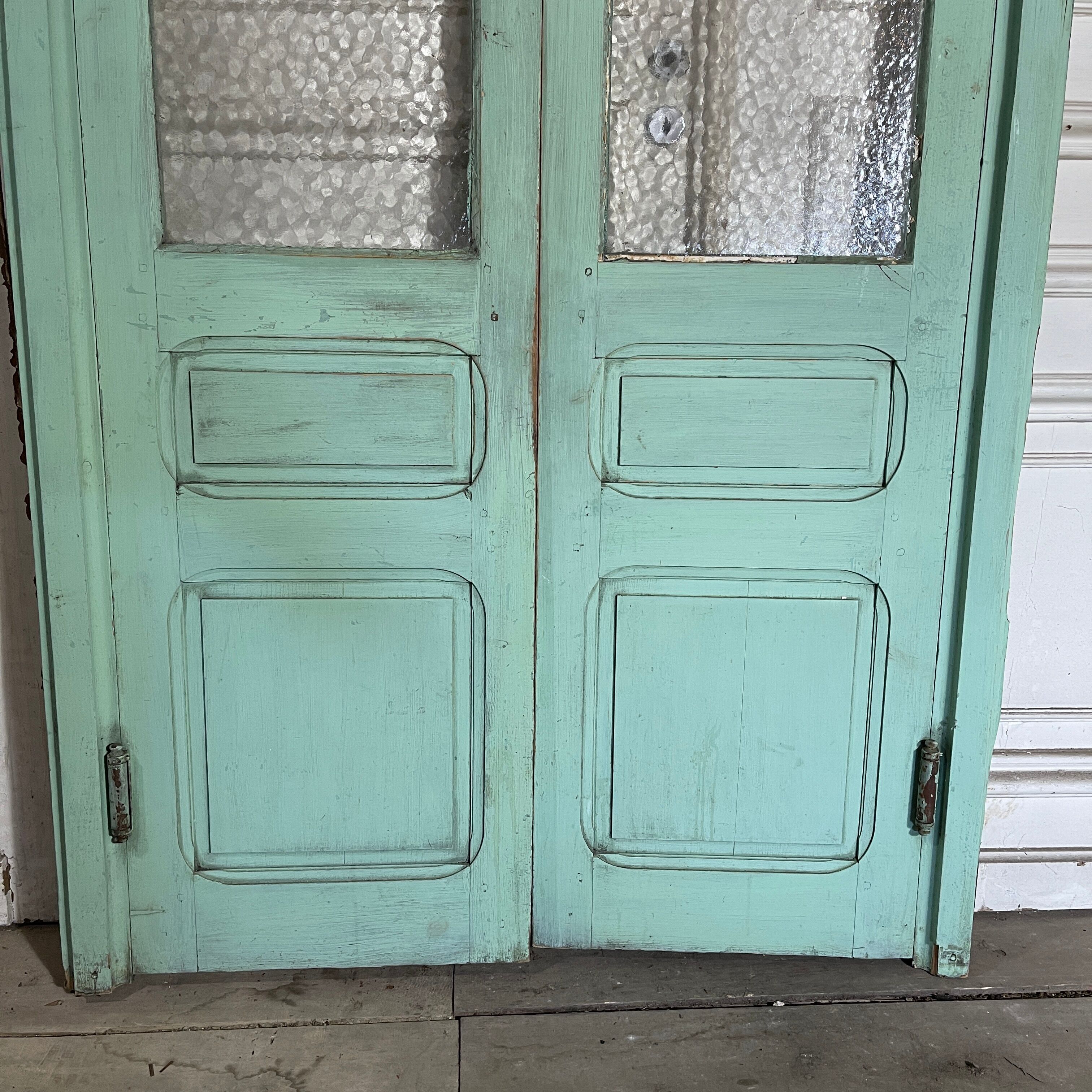 Old pair of saloon type glass doors