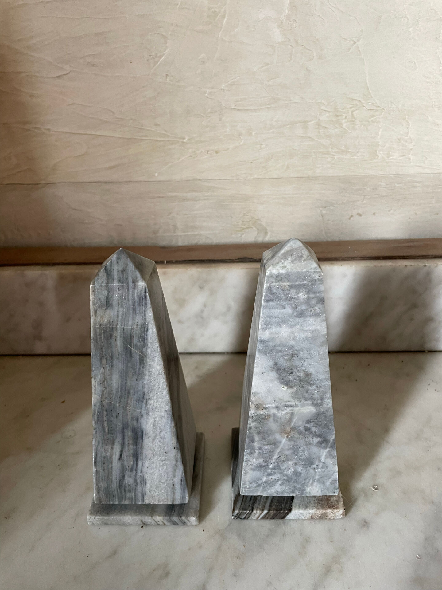 pair of obelisk bookends in marble Art Deco style