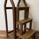 Stool transforming into a step ladder.