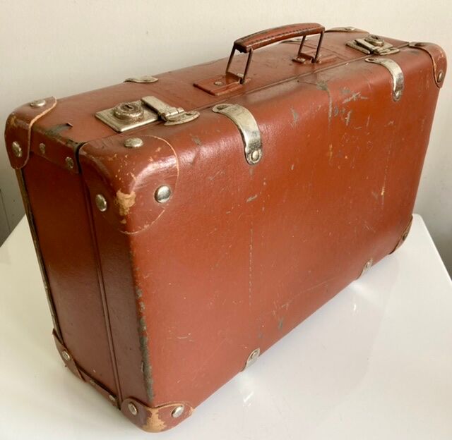 Small old brown suitcase