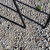 Pair of tonneau chairs by Pierre Guariche plywood base tubes 1954