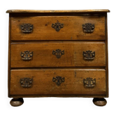 Louis XIV period lady's chest of drawers in walnut and natural wood circa 1700