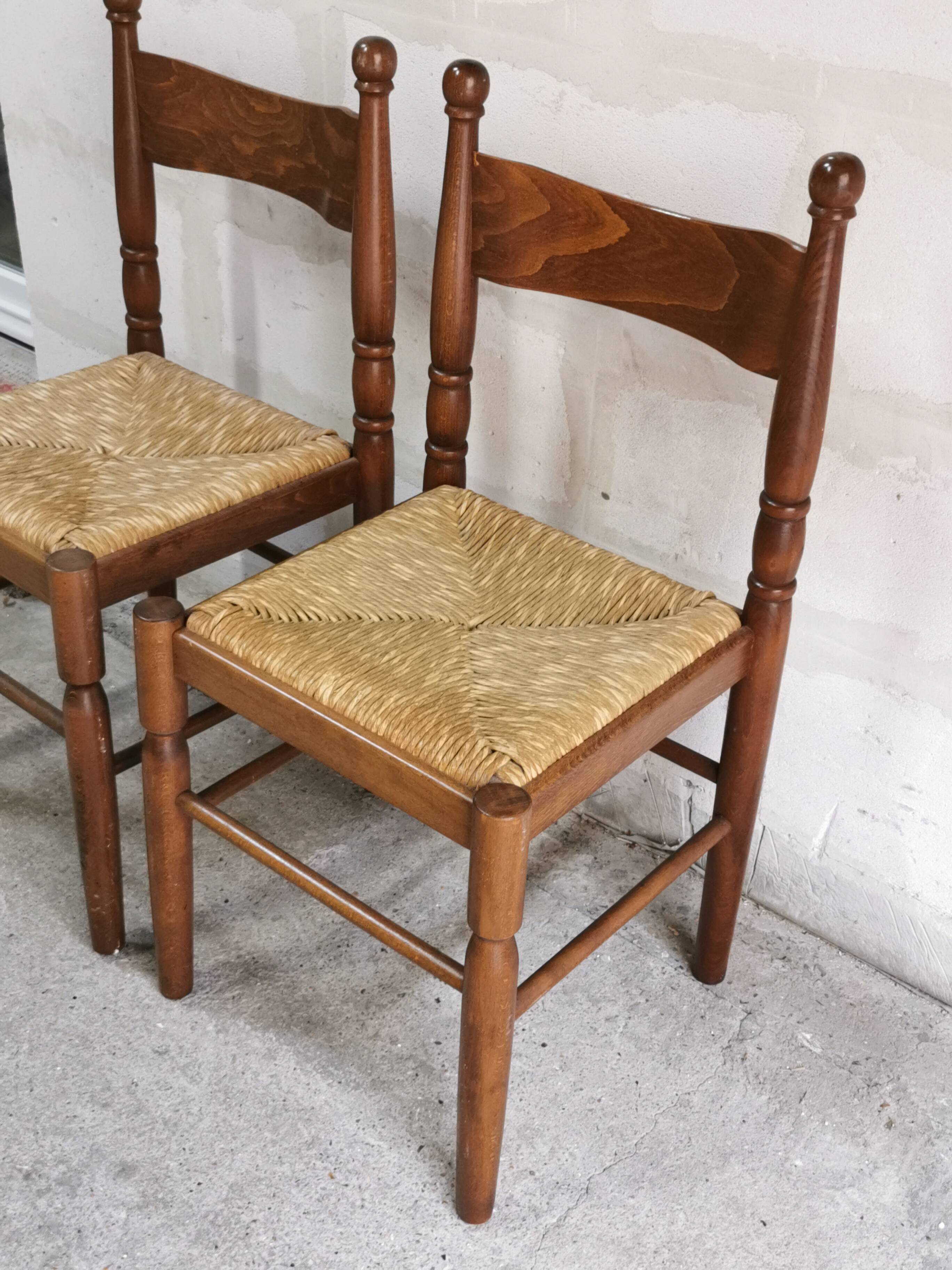 Pair of vintage wood and straw chairs