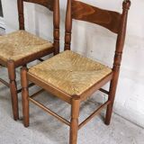 Pair of vintage wood and straw chairs