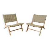 Pair of low armchairs in wood and woven rattan