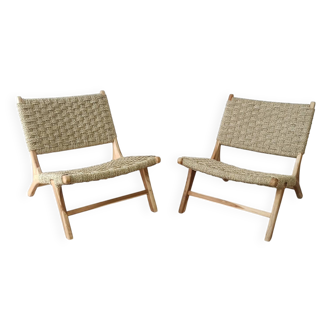 Paire de fauteuils bas en bois et rotin tissé