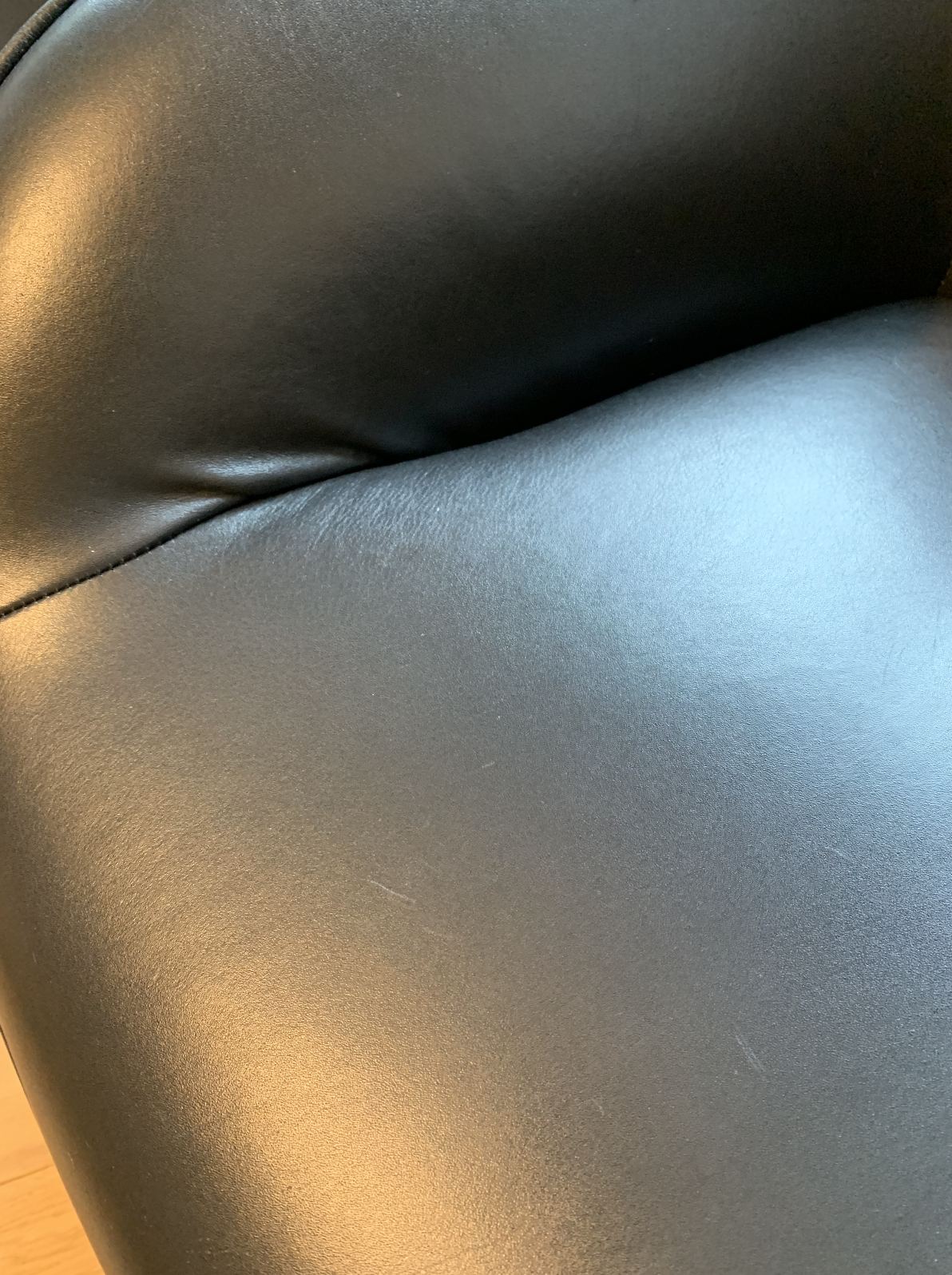 Roche Bobois leather spoutnik armchairs