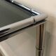 Console and chrome faux-bamboo mirror