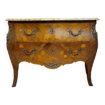 Curved Louis XV style commode with floral marquetry and marble top.