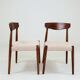 Set of two dining chairs in Scandinavian design.