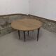 Half-moon extendable oak table for 2 to 8 people.