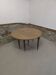 Half-moon extendable oak table for 2 to 8 people.