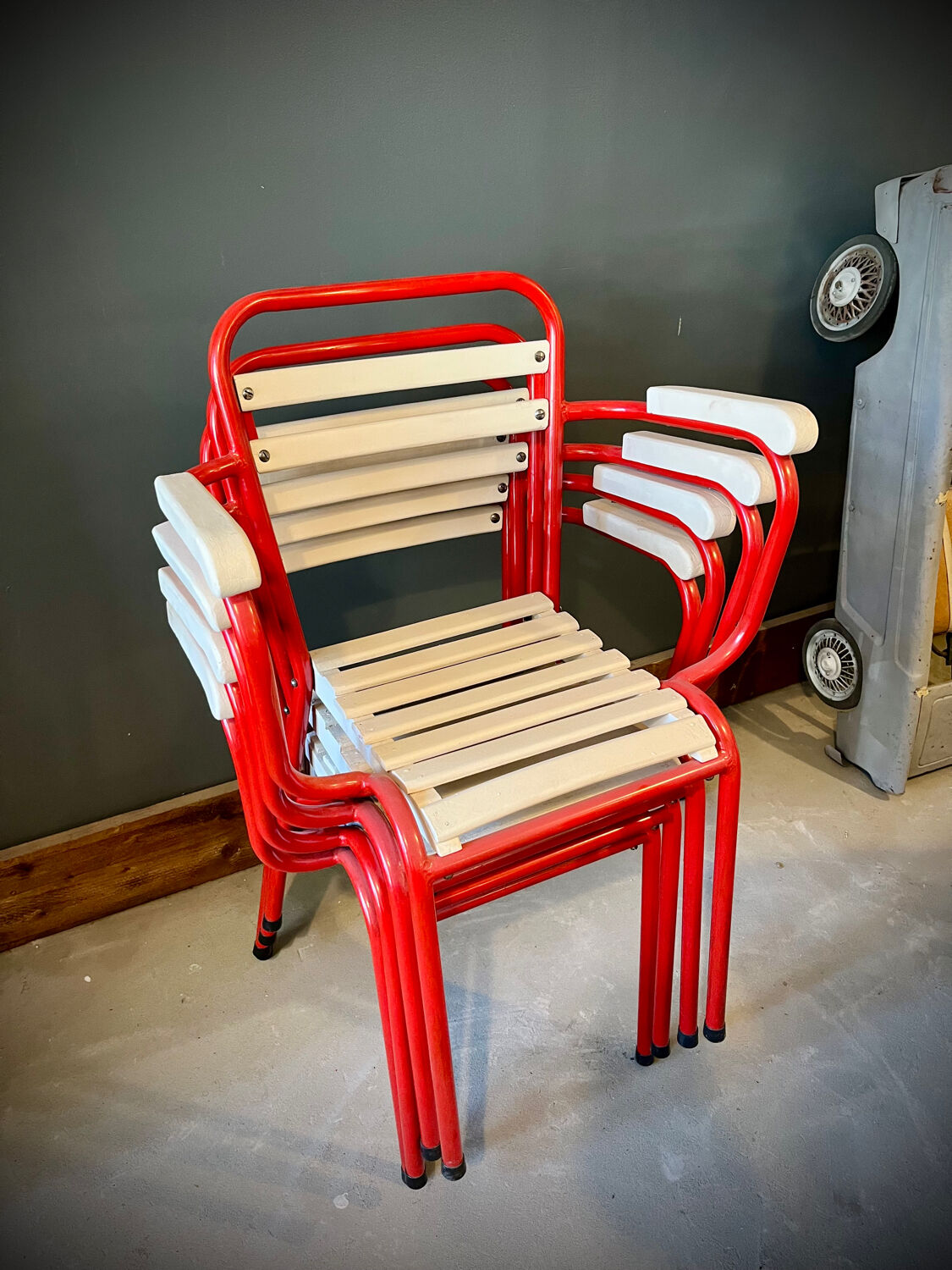 Four TOLIX chairs with armrests