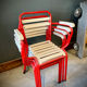 Four TOLIX chairs with armrests