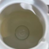 Plain white porcelain teapot