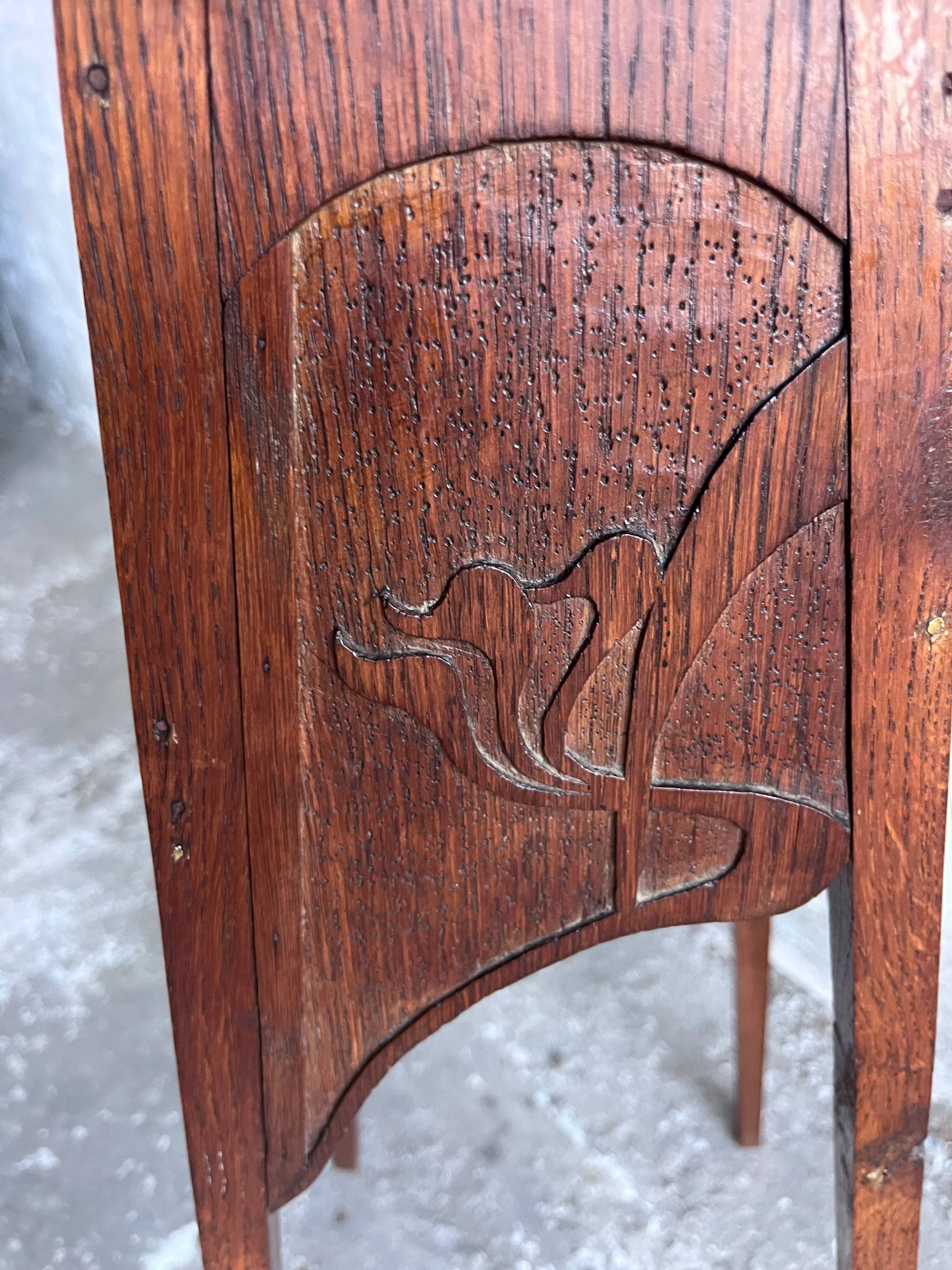 Sculpted wooden plant stand in Art Nouveau style, circa 1910.