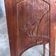 Sculpted wooden plant stand in Art Nouveau style, circa 1910.