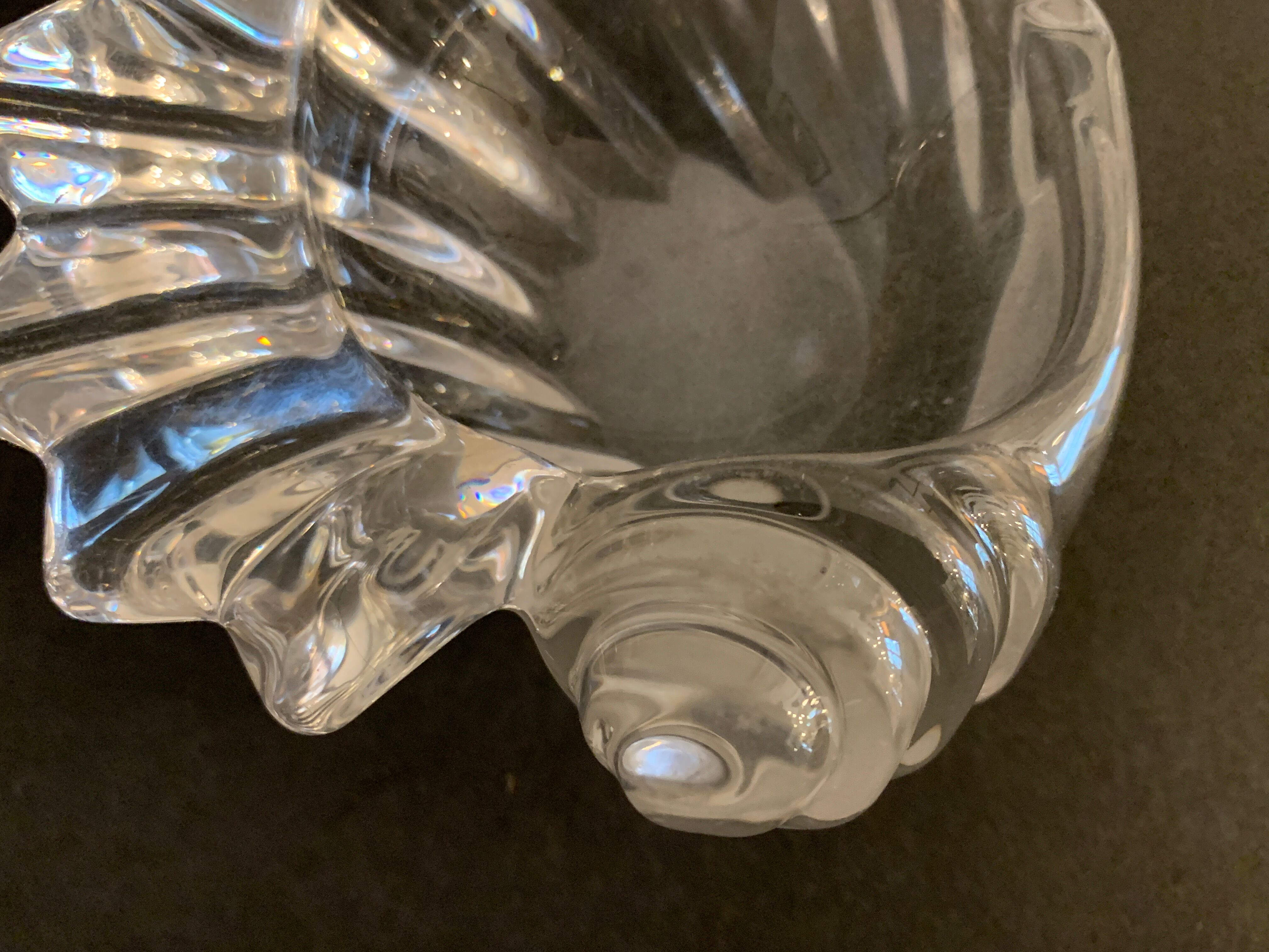 Empty crystal pocket in the shape of a shell