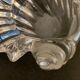 Empty crystal pocket in the shape of a shell