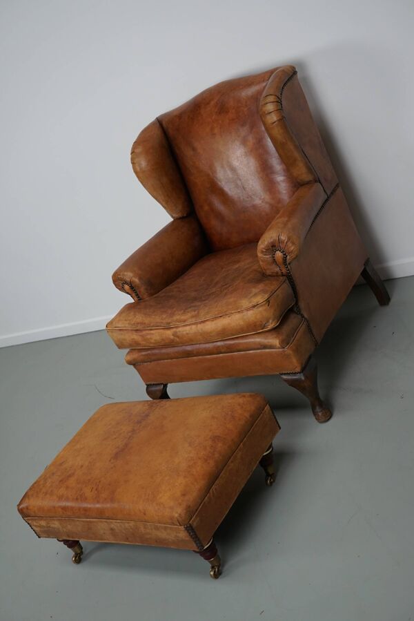 Fauteuil club vintage hollandais en cuir couleur cognac, avec repose-pieds