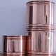 three cylindrical plant pots in a Scandinavian design from the 80s