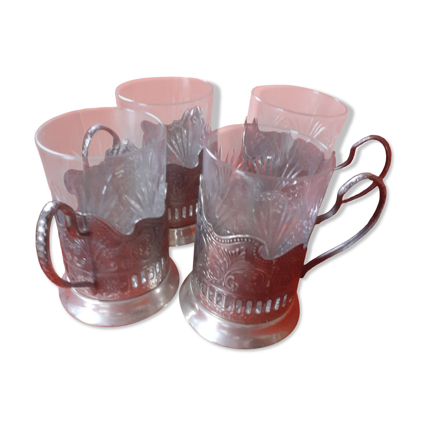 4 glasses engraved on their silver metal support;