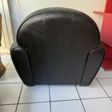 Matching black leather armchair – comfort and elegance
