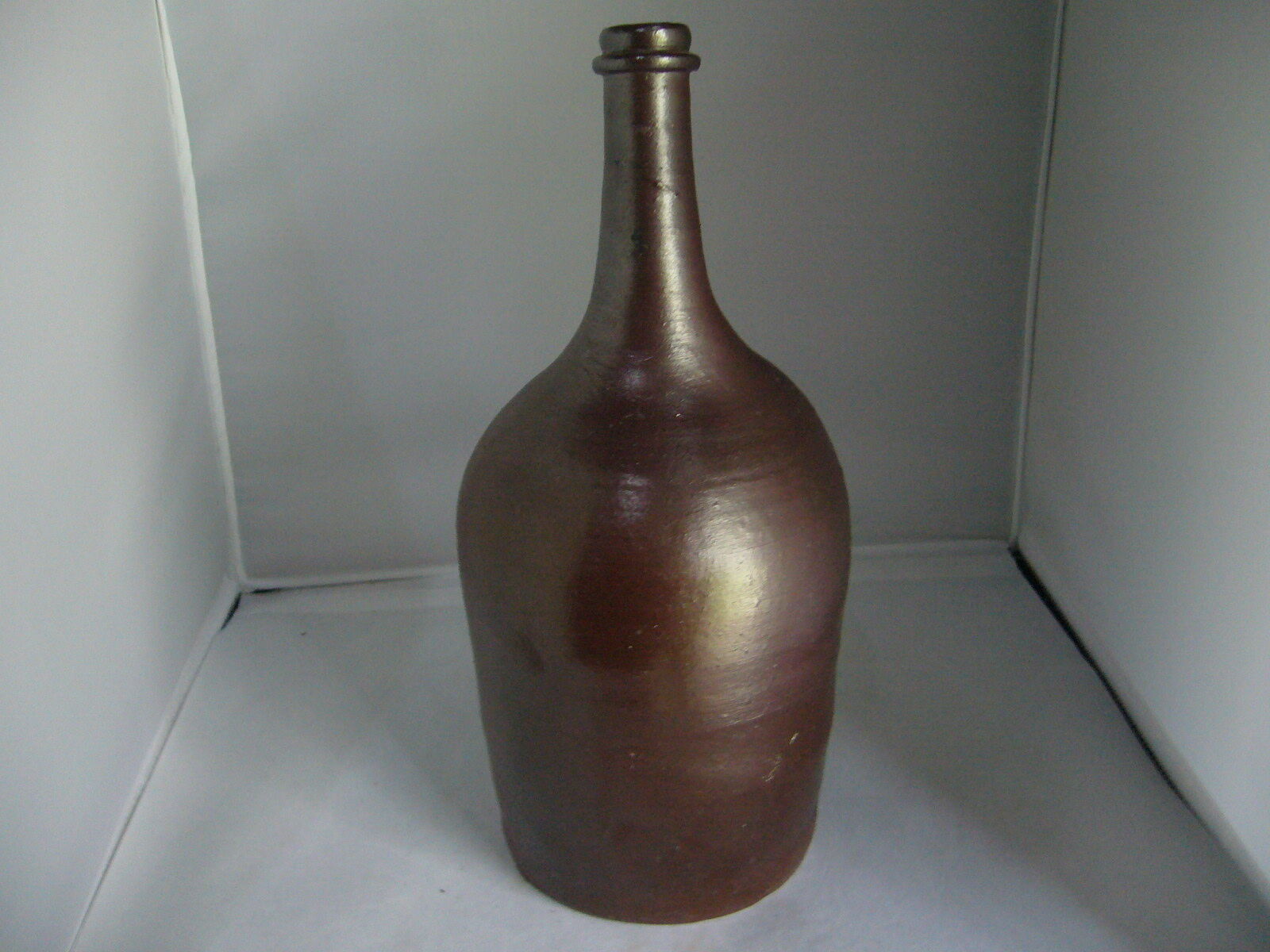 terracotta bottle varnished of particular shape