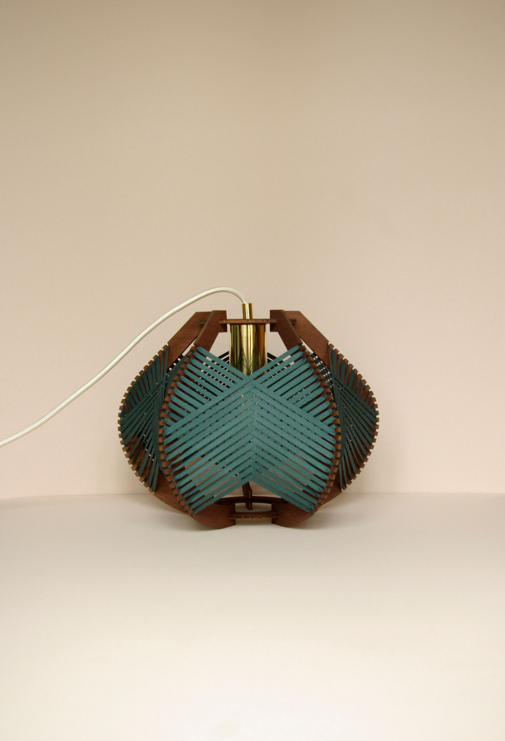 Dark green woven lamp to hang