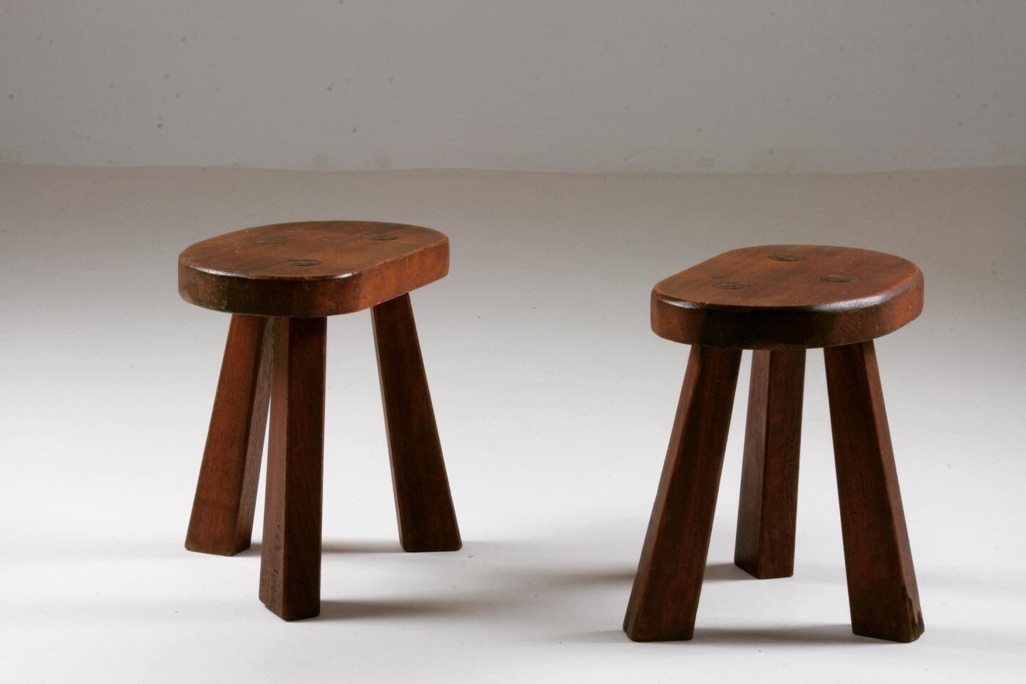 Pair of tripod brutalist stools, France 1950s