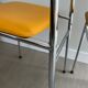 LM vintage chrome and orange/mustard yellow faux leather chairs