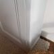 Old white asymmetrical chest of drawers