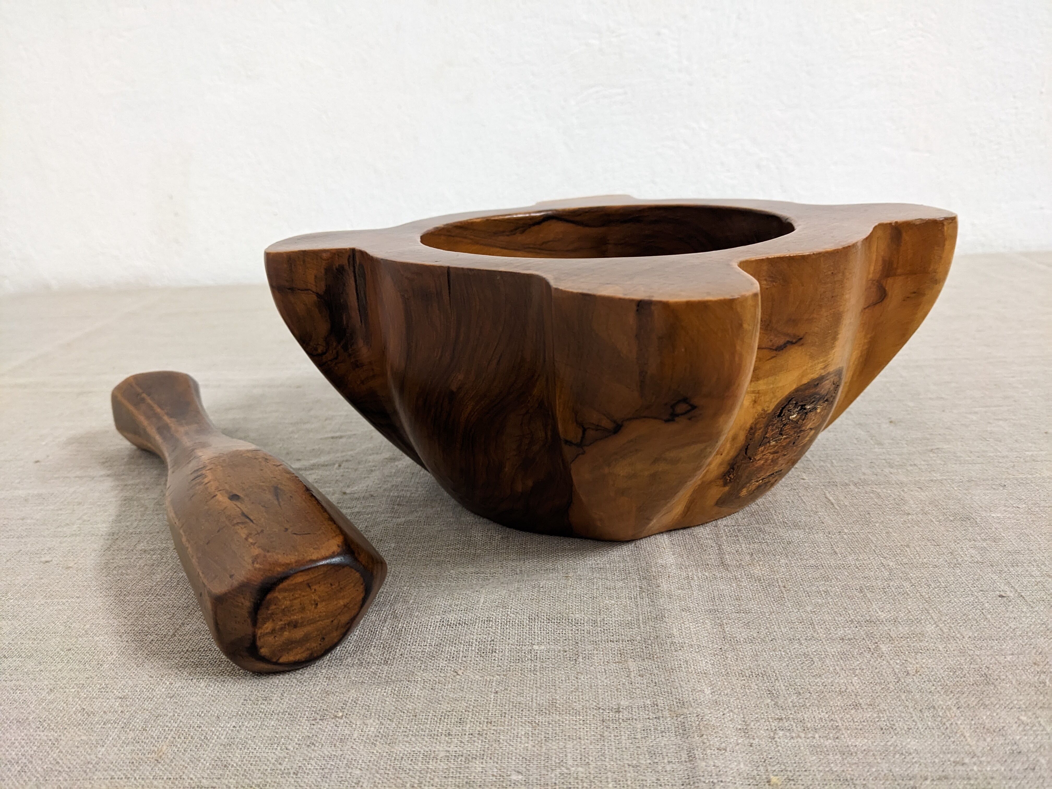 Mortar and its vintage olive wood pestle