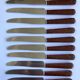 12 table knives stainless steel blade round ends / Bakelite handles with wood burl effect / 1950s