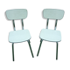 Pair of pale yellow formica chairs