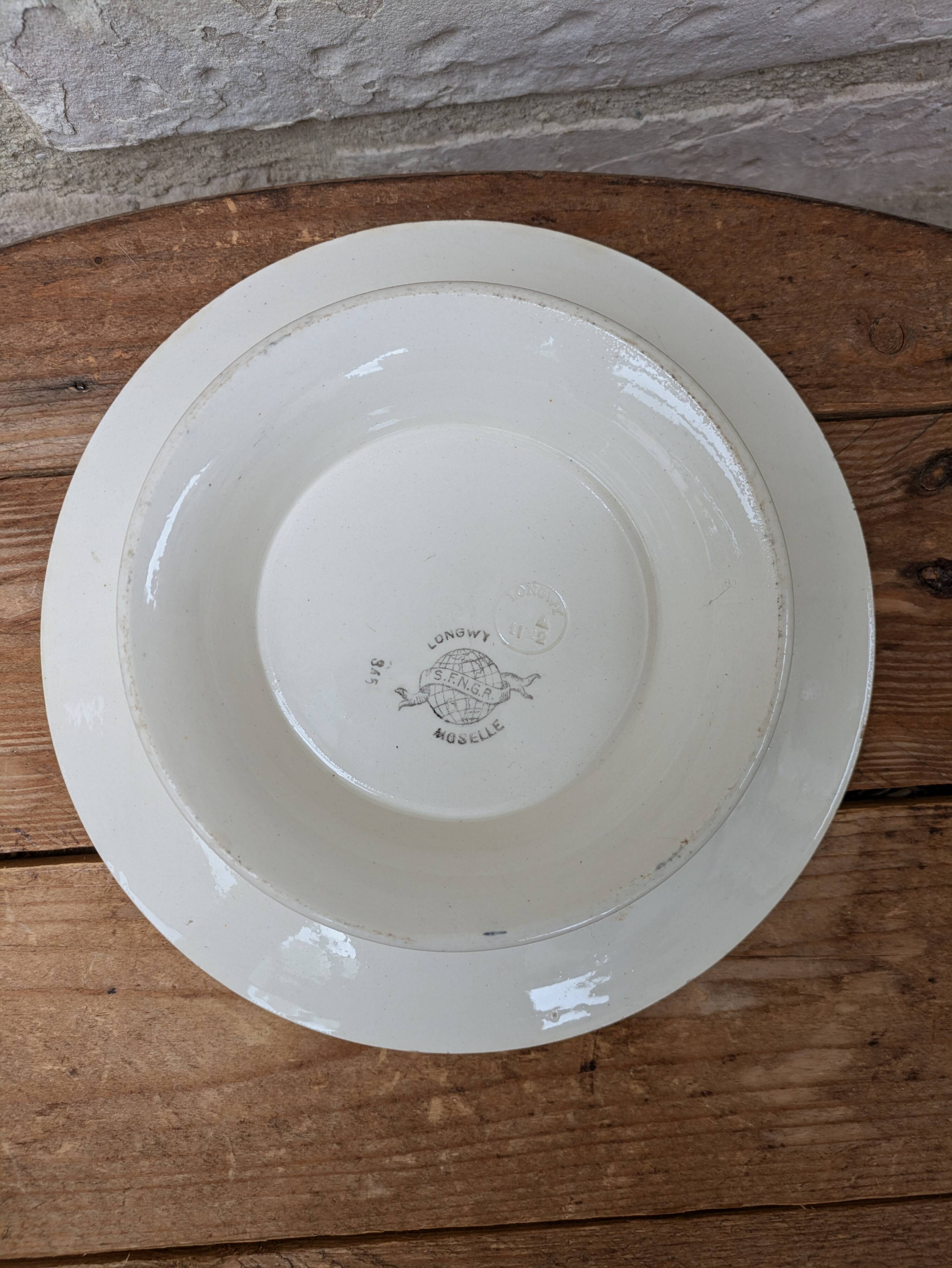 Old plate on pedestal serving dish Longwy Moselle model