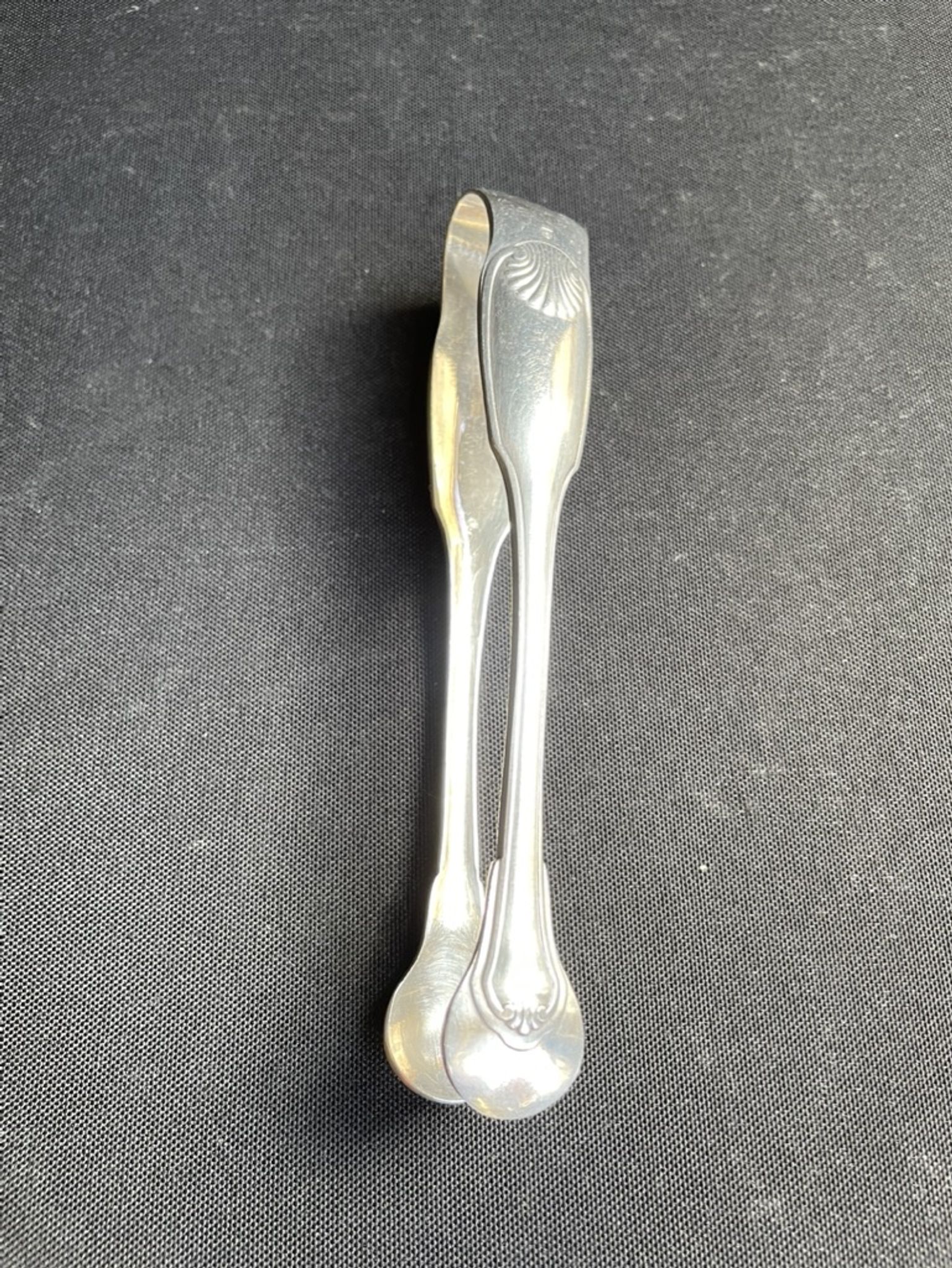 Pince à sucre en métal argenté Christofle modèle Vendôme/Arcantia avant 1983