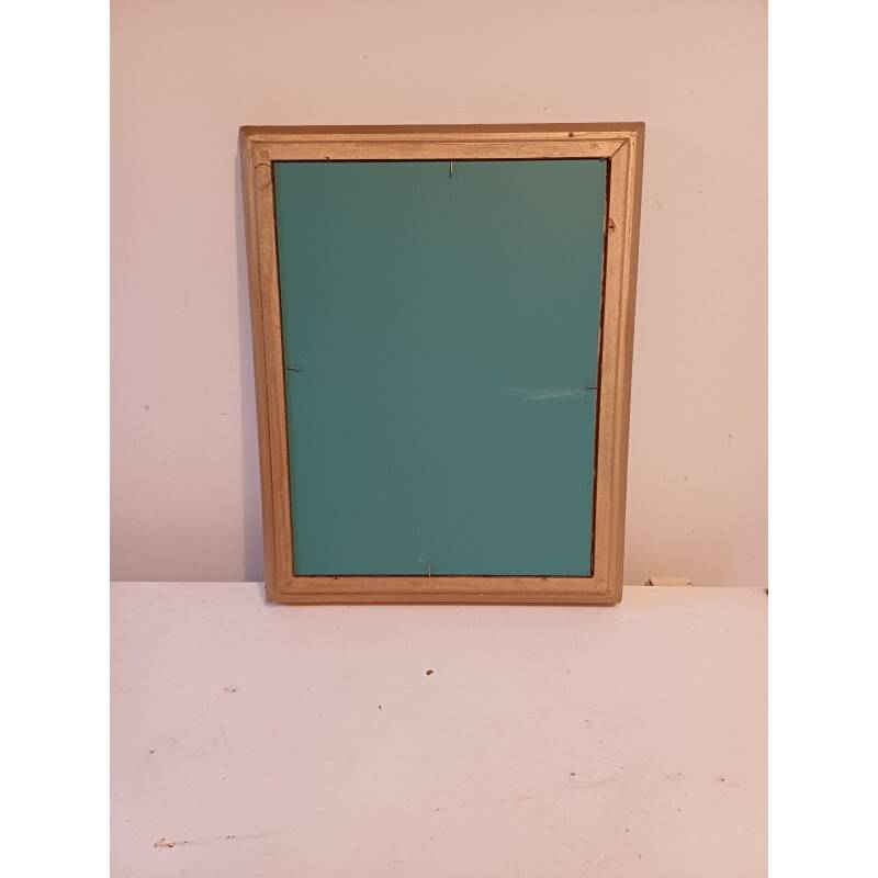 Wooden mirror and gold trim