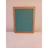 Wooden mirror and gold trim